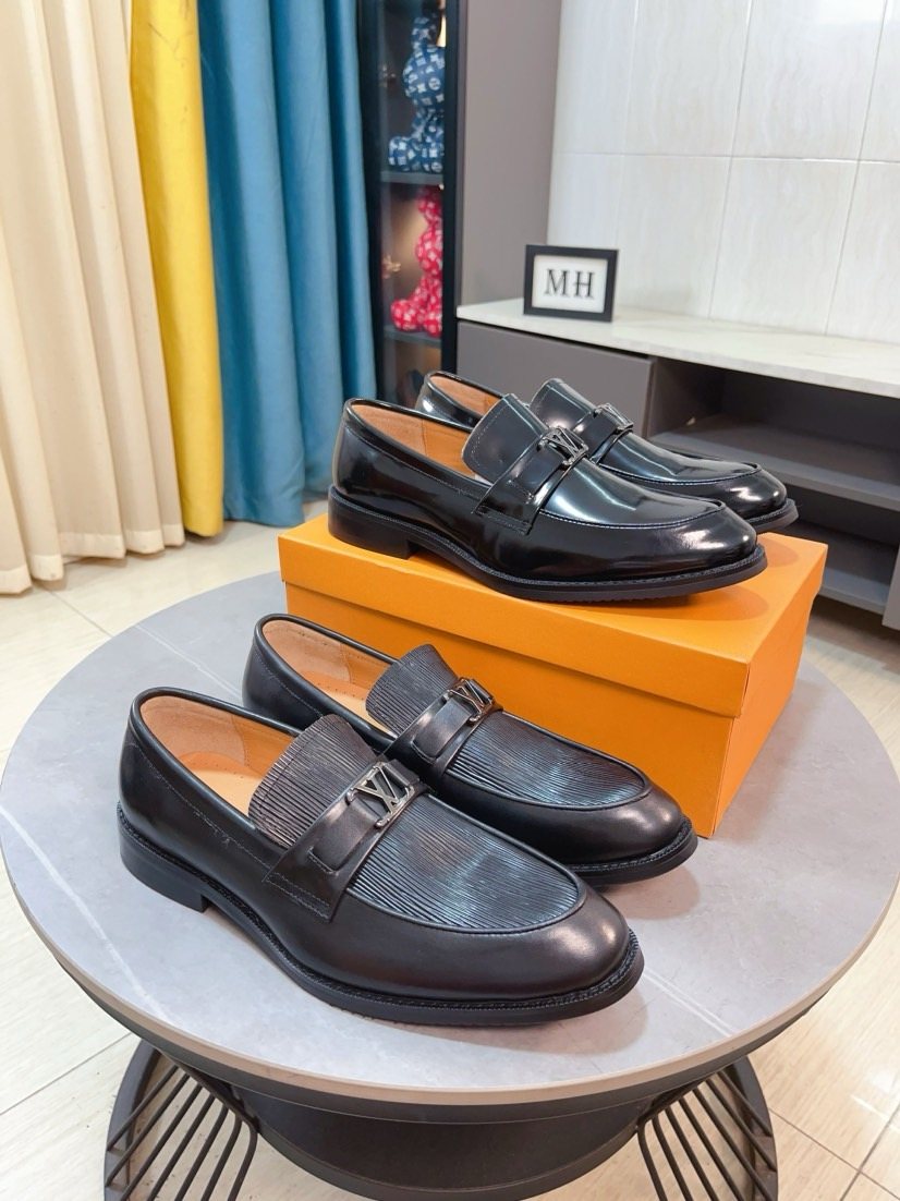 Louis Vuitton Men's Black Textured Buckle Loafers - Rounded Toe And Dark Sole